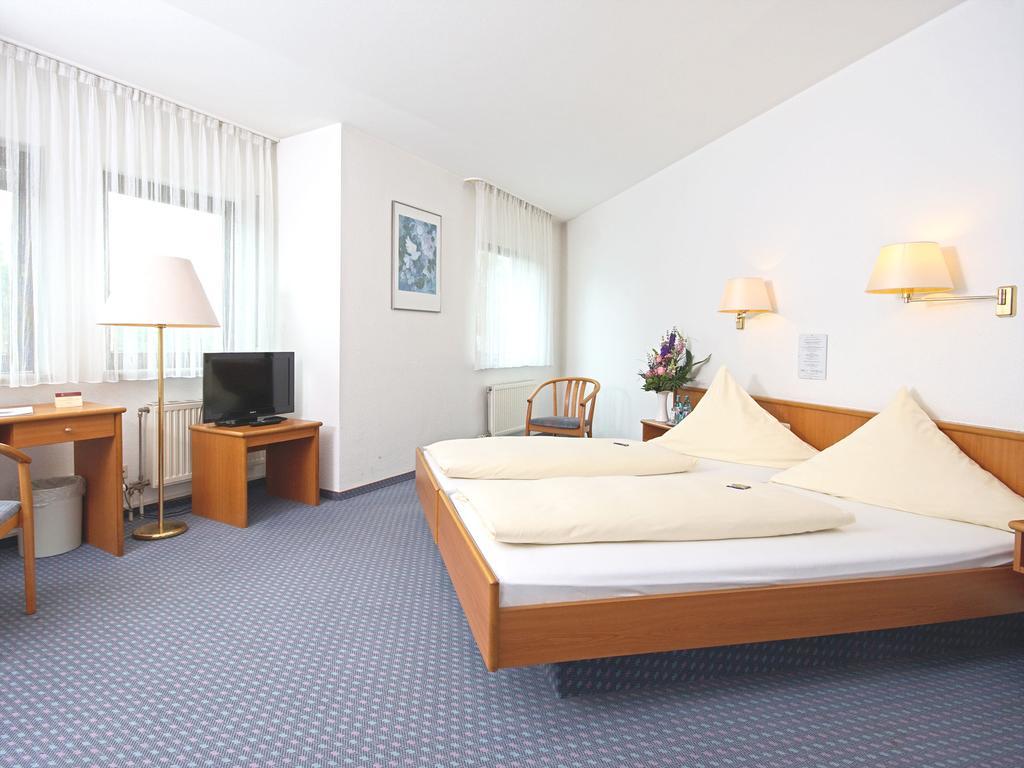 City Hotel Mark Michelstadt Quarto foto